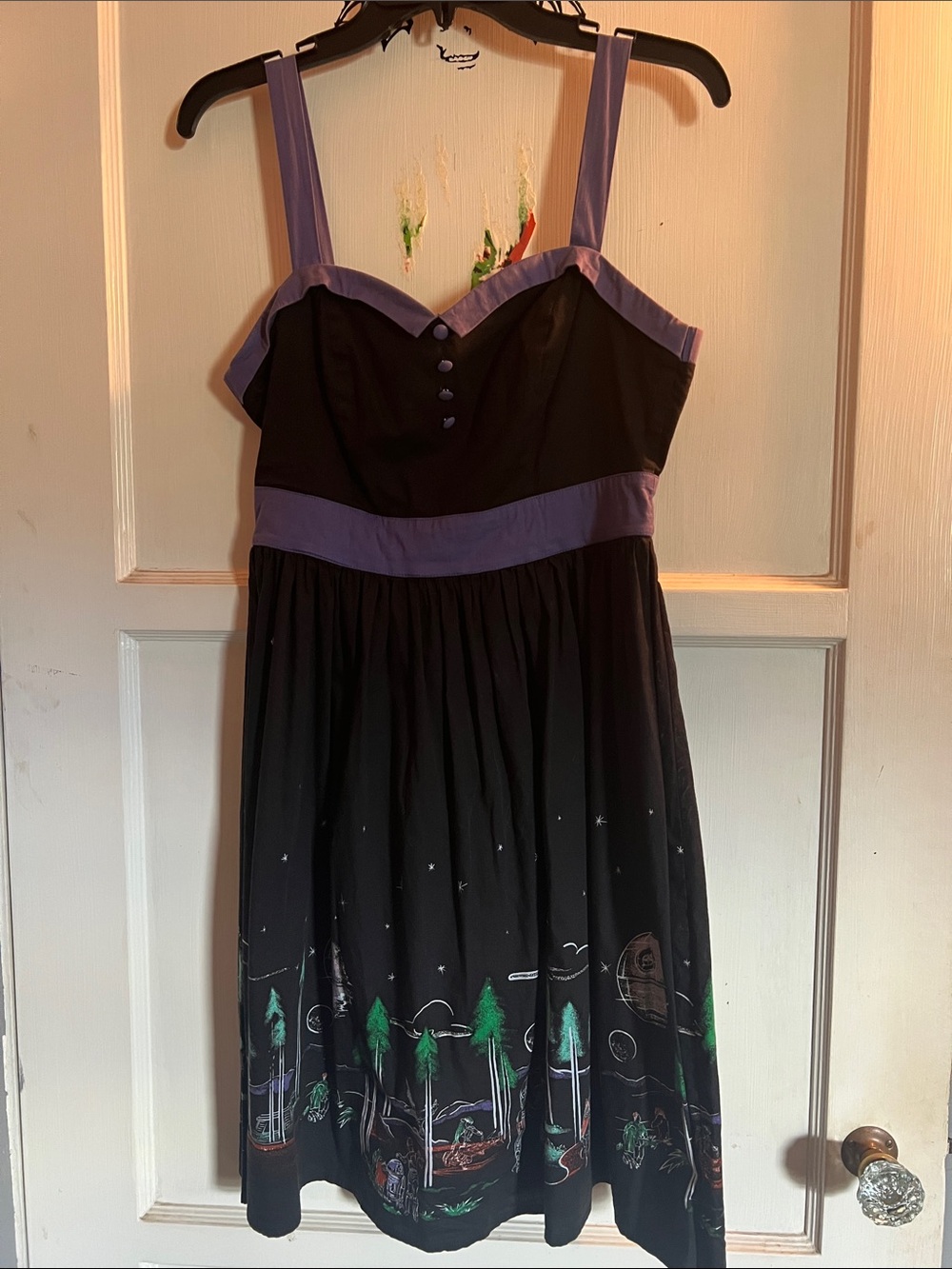 Her Universe Black Dress with Lavender Trim and Scenic Hem Print